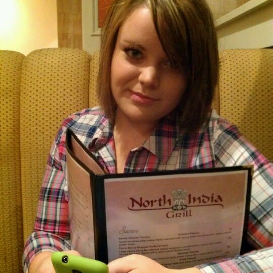 Photo taken at North India Bar &amp; Grill by Alexis L. on 1/26/2012