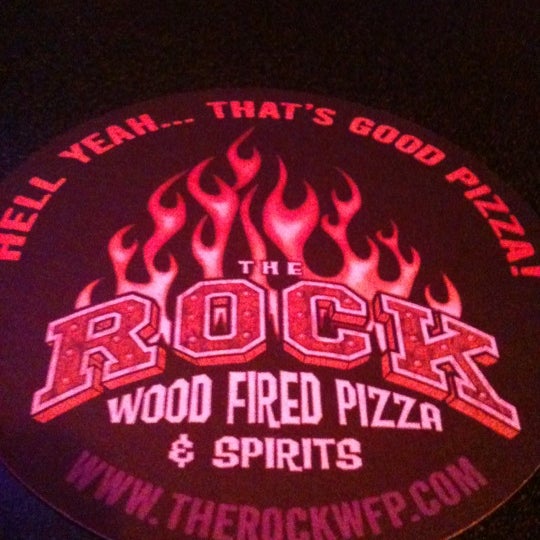 Photo taken at The Rock Wood Fired Pizza by Just P. on 11/8/2011