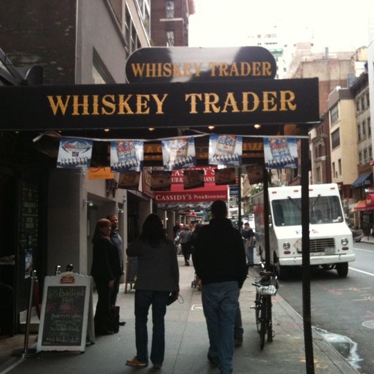 Photo taken at Whiskey Trader by Angie B. on 9/17/2011