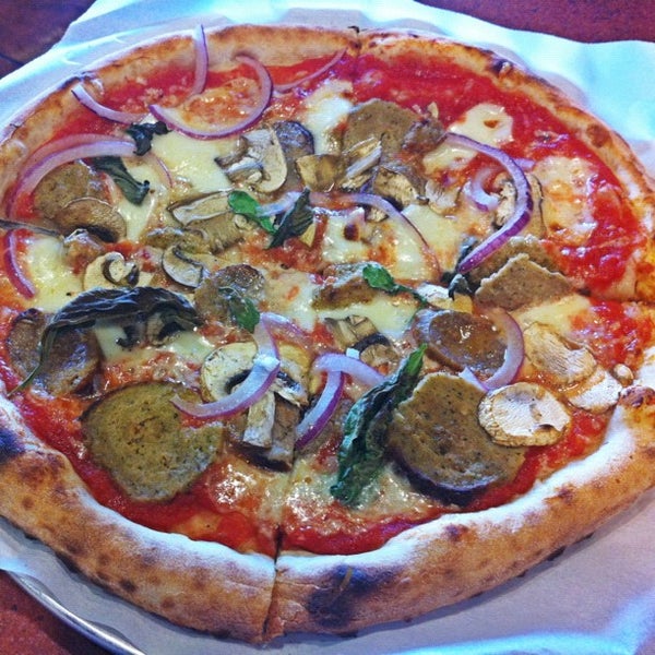Photo taken at Custom Built Pizza by Rob M. on 7/23/2012