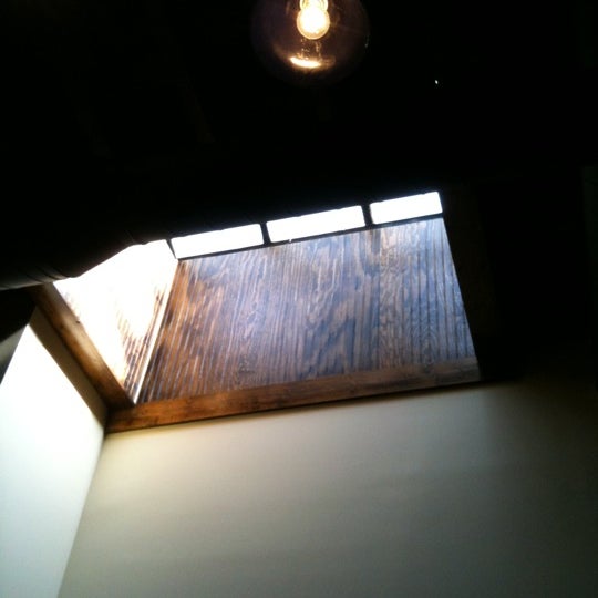 Photo taken at Central Coffee Company by Winn M. on 4/11/2011