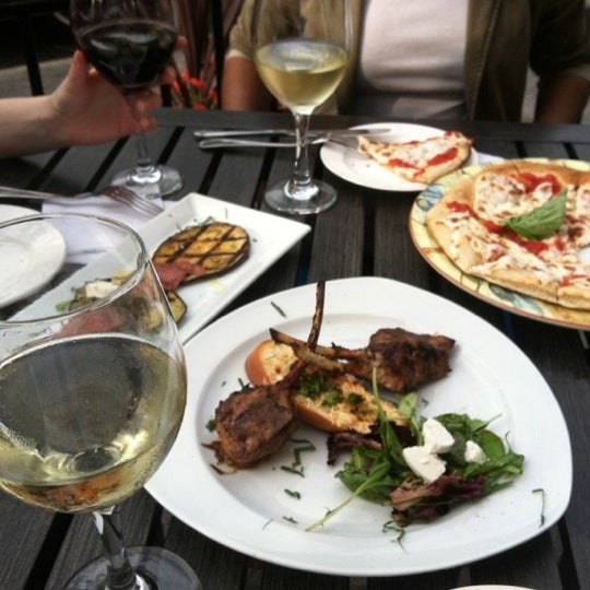 $5 wine during happy hour. Bar appetizers are elegant and tasty - esp. the lamb kabobs and the eggplant dishes.