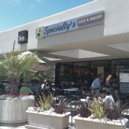 Photo taken at Specialty’s Café &amp; Bakery by Doug C. on 6/14/2011