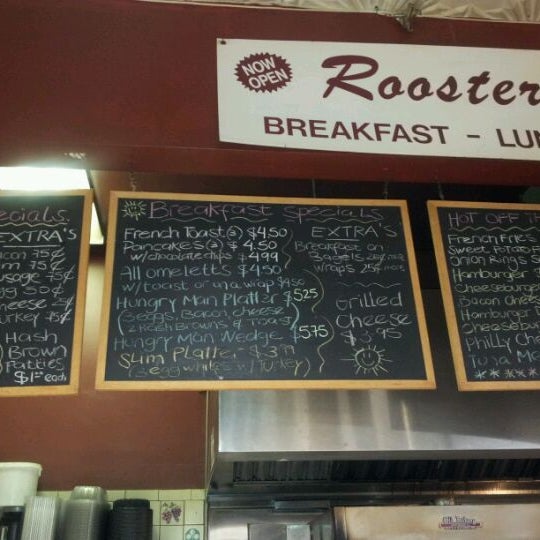 Photo taken at Rooster&#39;s Market by Zato I. on 6/1/2012