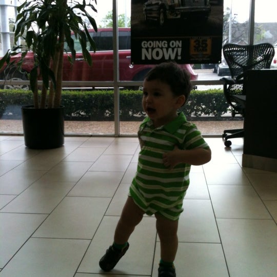 Photo taken at Planet Ford Dallas by Kristen G. on 3/17/2012