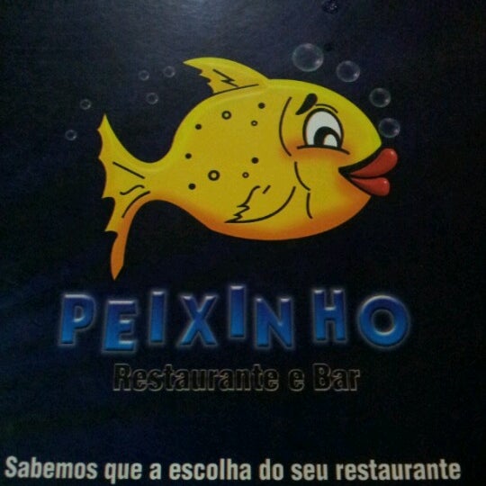 Photo taken at Peixinho Bar e Restaurante by Michel J. on 7/28/2012