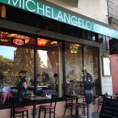 Photo taken at Michelangelo Caffe by Raquel M. on 8/1/2012