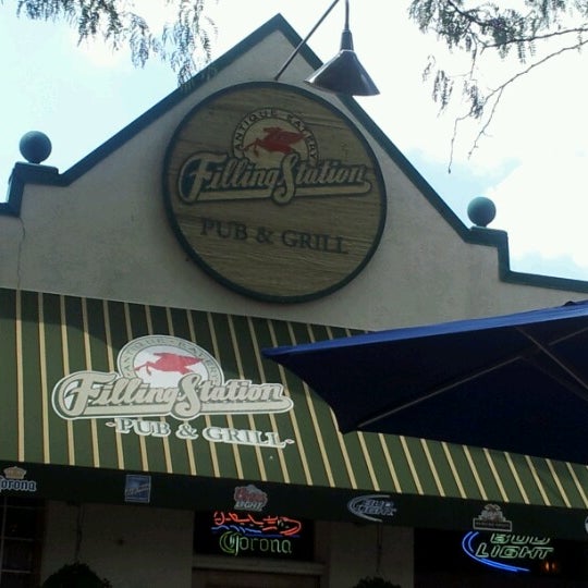Photo taken at Filling Station Pub &amp; Grill by Tammi C. on 7/11/2012
