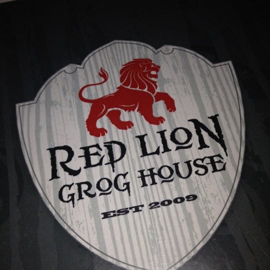 Photo taken at Red Lion Grog House by Ben R. on 3/3/2012