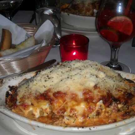 Photo taken at Lasagna Restaurant by Sophia P. on 2/21/2012