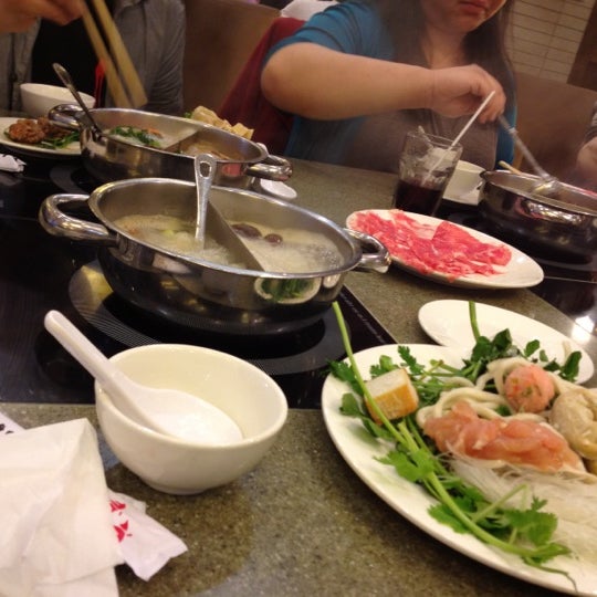 Photo taken at Happy Lamb Hot Pot by Merry on 4/19/2012