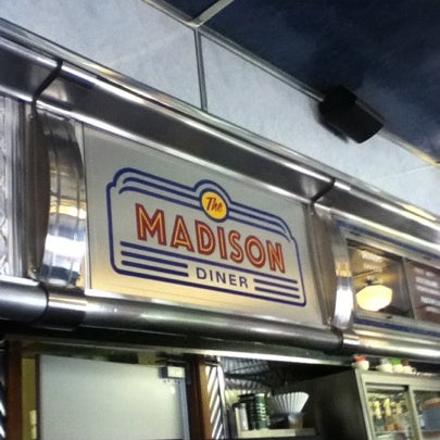 Photo taken at The Madison Diner by Thomas M. on 7/28/2012