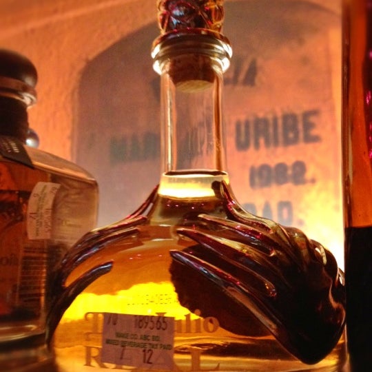 Photo taken at Calavera Empanadas &amp; Tequila Bar by Bruce K. on 7/20/2012