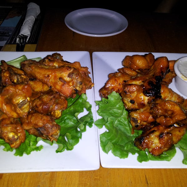 WhyDidIEatThis.com reviewed Arcadia Tavern's wings on the recommendation of several people