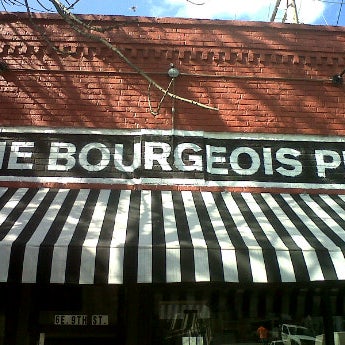 Photo taken at The Bourgeois Pig by Avery J. on 4/16/2012
