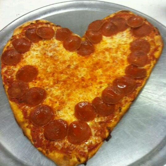Photo taken at Joe&#39;s Pizza by Lorenzo C. on 2/19/2012