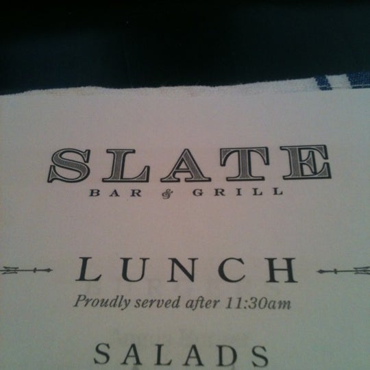 Photo taken at Slate Bar &amp; Grill by Michael M. on 2/22/2012