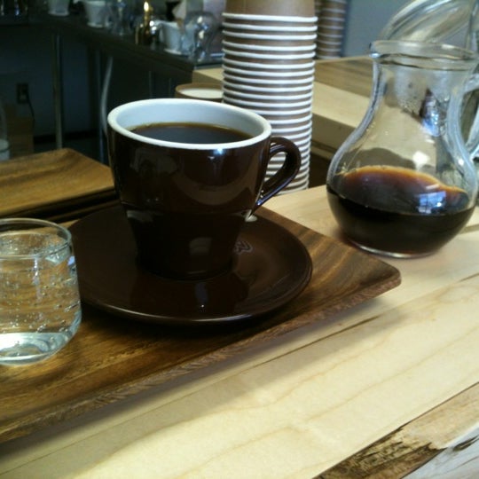 Photo taken at Evocation Coffee by Alex C. on 5/1/2012