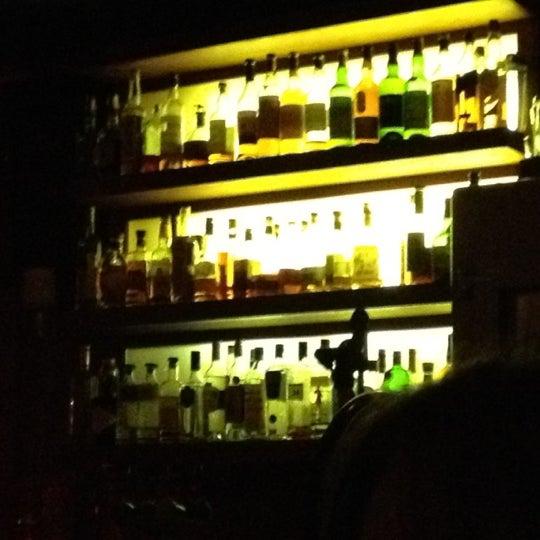 Photo taken at Sol Liquor Lounge by Brett S. on 4/17/2012