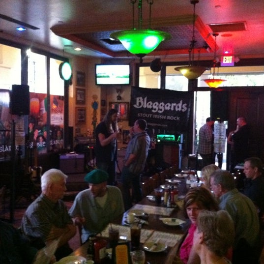 Photo taken at Slainte Irish Pub + Kitchen by Chad S. on 3/30/2012