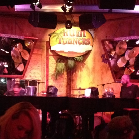 Photo taken at Rum Runners Dueling Piano Bar by Samantha P. on 4/15/2012