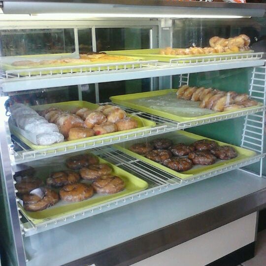 Photo taken at Freret Street Poboys &amp; Donuts by Lauren D. on 7/3/2012