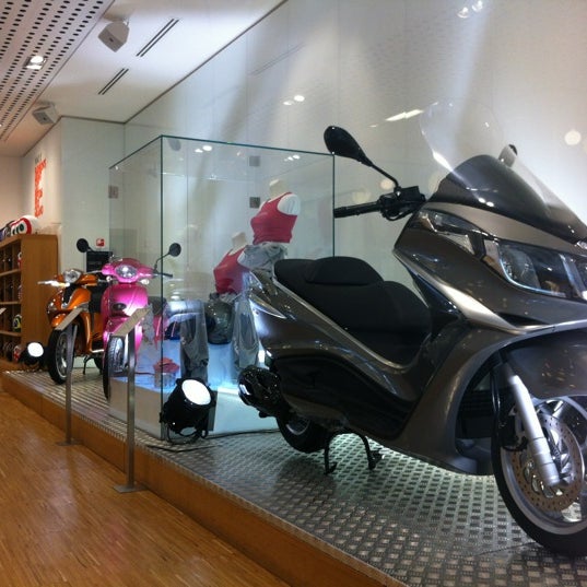 Photo taken at Motoplex Milano City Lounge by Barbara T. on 9/7/2012