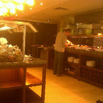 Photo taken at Jumeira Rotana Hotel by Bob H. on 6/29/2012