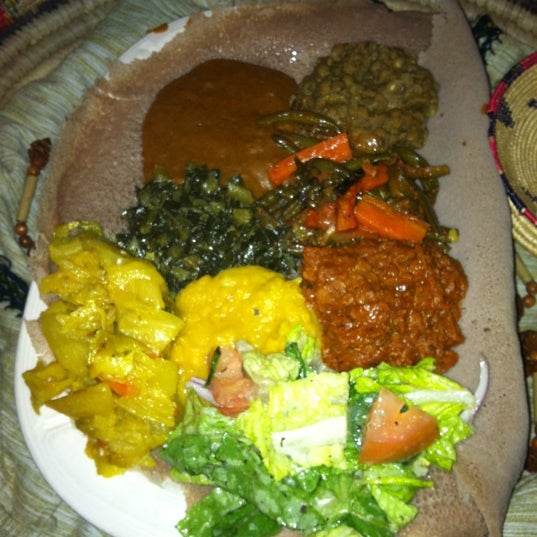 Photo taken at Abyssinia Ethiopian Restaurant by Courtney C. on 3/6/2012
