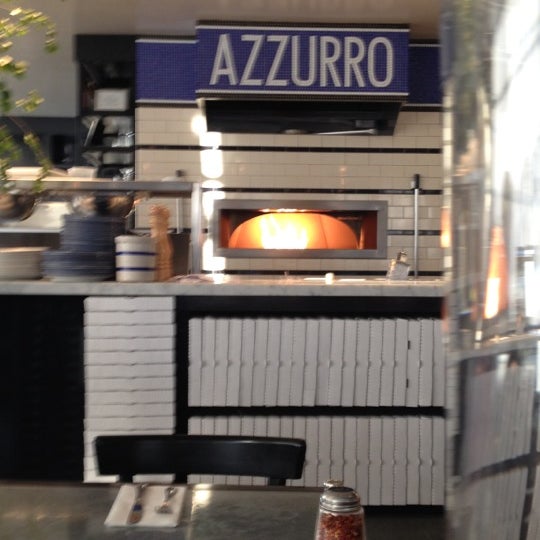 Photo taken at Azzurro Pizzeria e Enoteca by Kaitlin N. on 6/12/2012