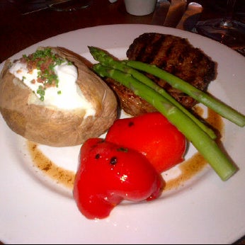 Photo taken at The Keg Steakhouse + Bar - Ottawa Market by Nicole G. on 6/3/2012