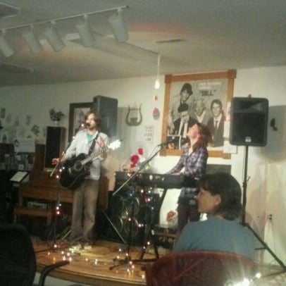 Photo taken at Uptown Bill&#39;s Coffeehouse &amp; Neighborhood Arts Center by El T. on 4/6/2012