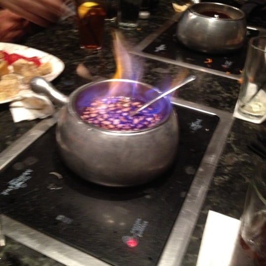 Photo taken at The Melting Pot by Janeen S. on 5/13/2012