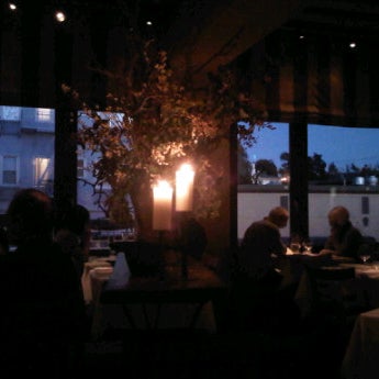 Photo taken at Oliveto Cafe &amp; Restaurant by Jerome P. on 3/4/2012