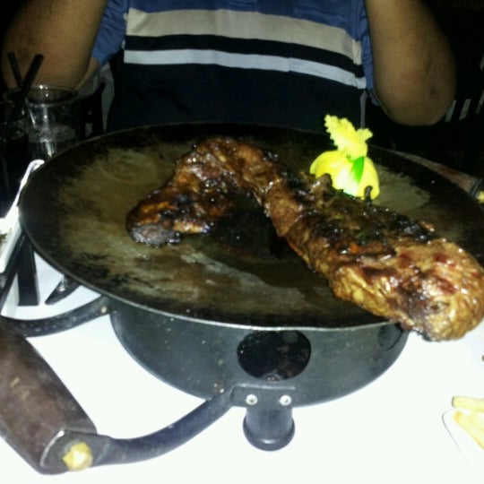 Photo taken at Baires Grill by jelovi on 7/27/2012