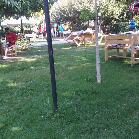 Photo taken at Çim Kahvaltı &amp; Mangal Bahçesi by Musa T. on 8/26/2012