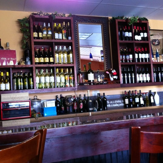 Photo taken at Tuscan Market &amp; Wine Shop by Jay B. on 7/10/2012