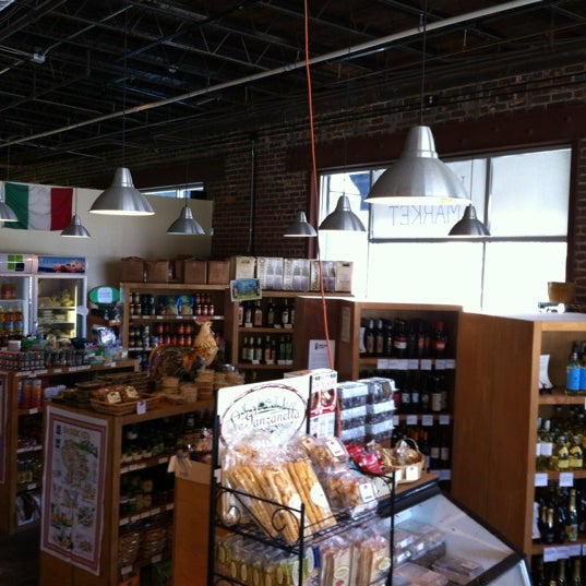 Photo taken at Toscano &amp; Sons Italian Market by Chris B. on 3/17/2012
