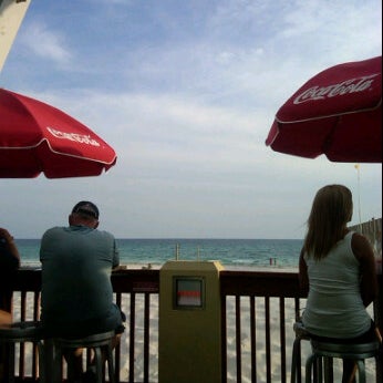 Photo taken at Hook&#39;d Pier Bar &amp; Grill by Erica J. on 5/15/2012