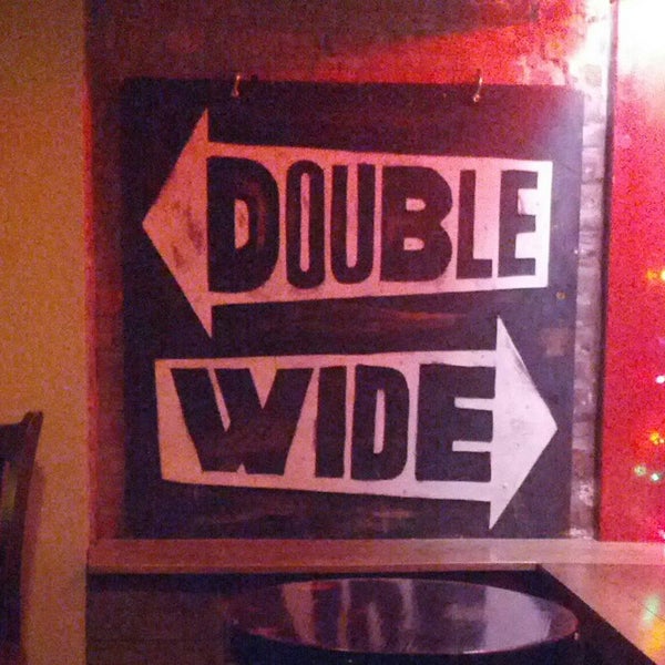 Photo taken at Double Wide Bar &amp; Southern Kitchen by Michael L P. on 8/6/2012