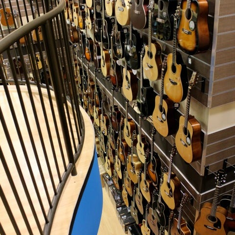 Photo taken at Cosmo Music - The Musical Instrument Superstore! by Christopher B. on 2/13/2012