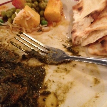 Photo taken at INDIA K&#39; RAJA Restaurant by Meredith H. on 7/24/2012
