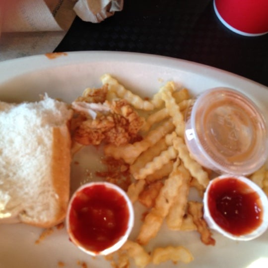 Photo taken at Raising Cane&#39;s Chicken Fingers by Luis D. on 5/7/2012