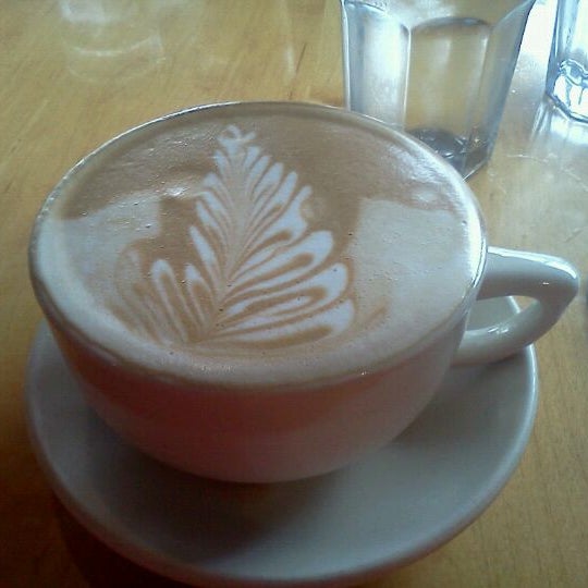 Photo taken at Wild Wheat Bakery Cafe &amp; Restaurant by Annie M. on 3/24/2012