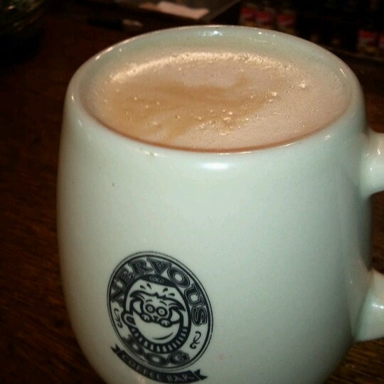 Photo taken at Nervous Dog Coffee Bar &amp; Roaster by Dan S. on 6/22/2012