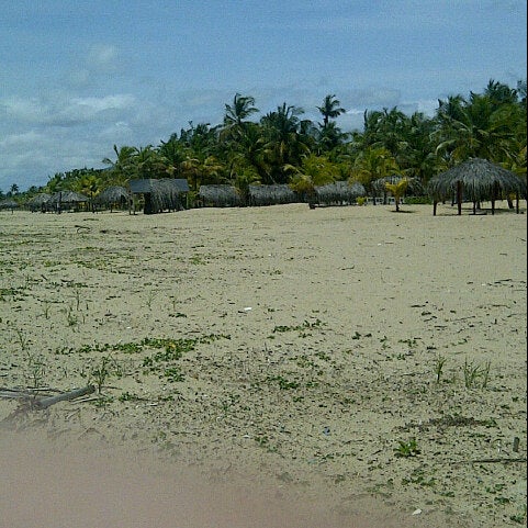 Photo taken at Playa de Boca de Uchire by maria b. on 8/12/2012