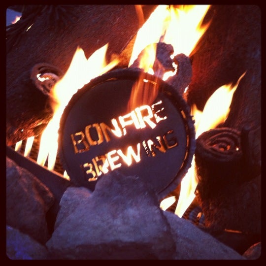 Photo taken at Bonfire Brewing by Sarah R. on 3/22/2012