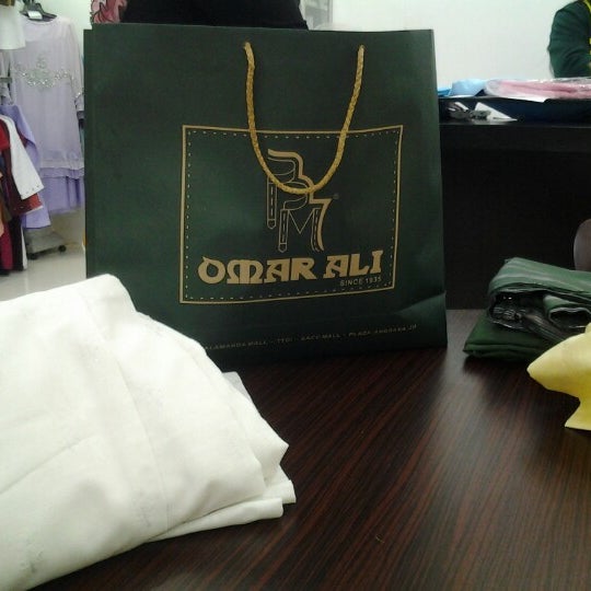 Photo taken at Omar Ali Boutique (TTDI) by Lalagee S. on 8/11/2012