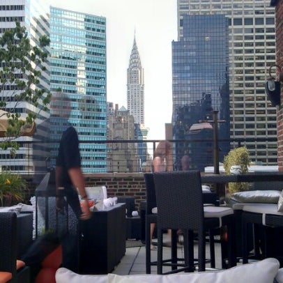 Photo taken at Renaissance New York Hotel 57 by Ken M. on 6/26/2012