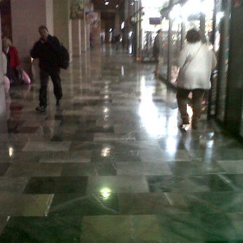 Photo taken at Centro Comercial El Parian by Alessandro R. on 2/10/2012